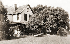 Oscar Johnson Home, after 1910 when porches were added, looking SW.