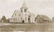 Lutheran Church and Parsonage about 1923. - Click to Enlarge. Photo of Lutheran Church and Parsonage.